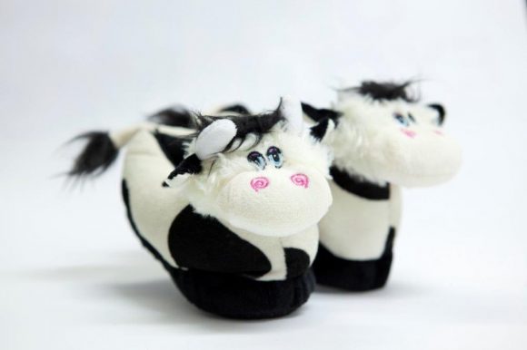 Child slippers in little cow shape