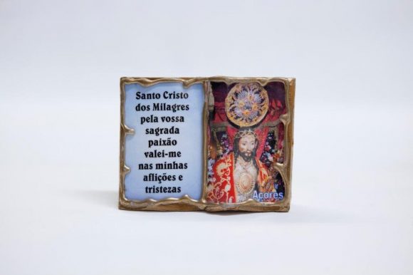Peça decorativa em resina livro do Senhor Santo Cristo dos Milagres